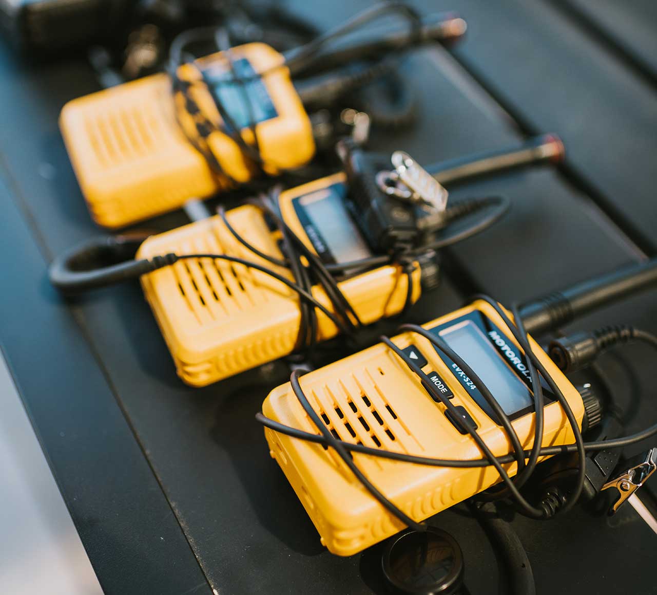 Row of Yellow Walkie Talkies