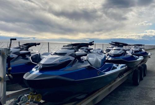 6 Brand new Seadoo jet skis on a trailer